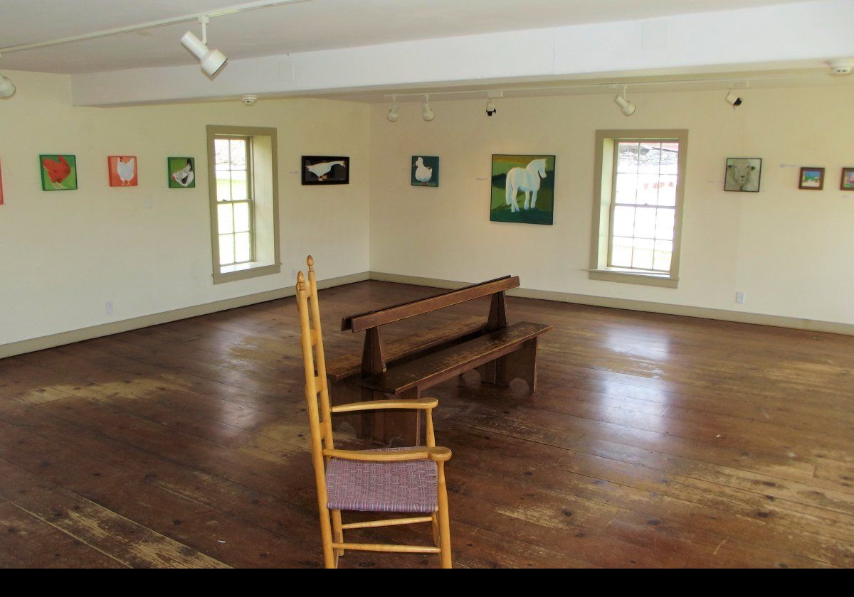 The lower floor of the Brick Poultry House serves as gallery space for local artists.